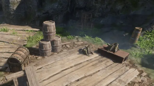 Metal debris, broken furniture and barrels on a wooden platform in Rookmore